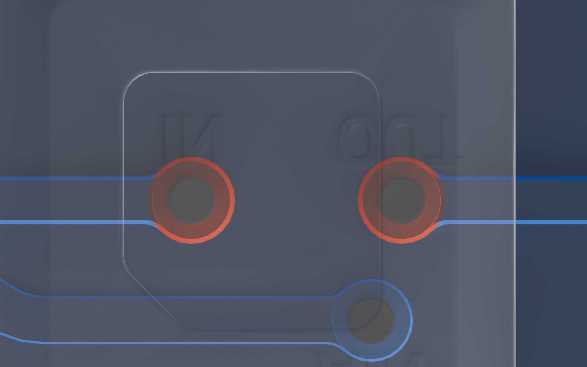 Close-up of the two vias under an MV-1 microvalve with at least 550 µm of spacing between the vias.
